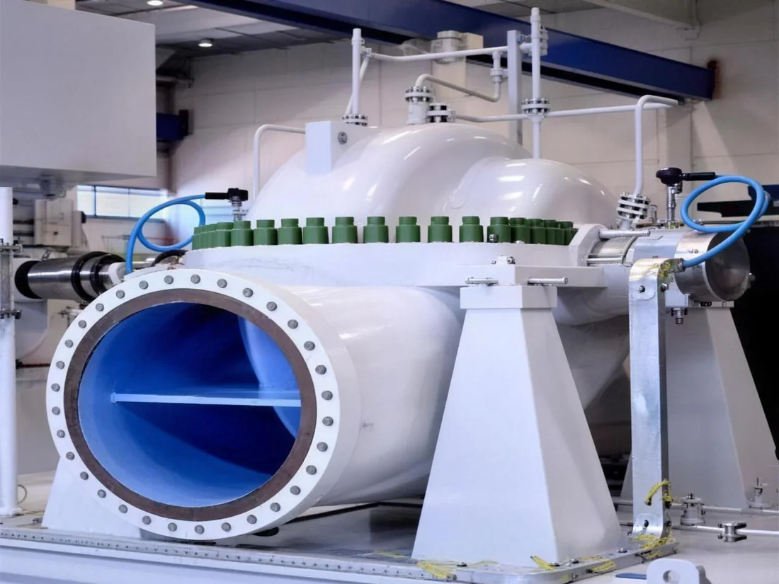 Split-case industrial process pump with its casing opened on the assembly floor