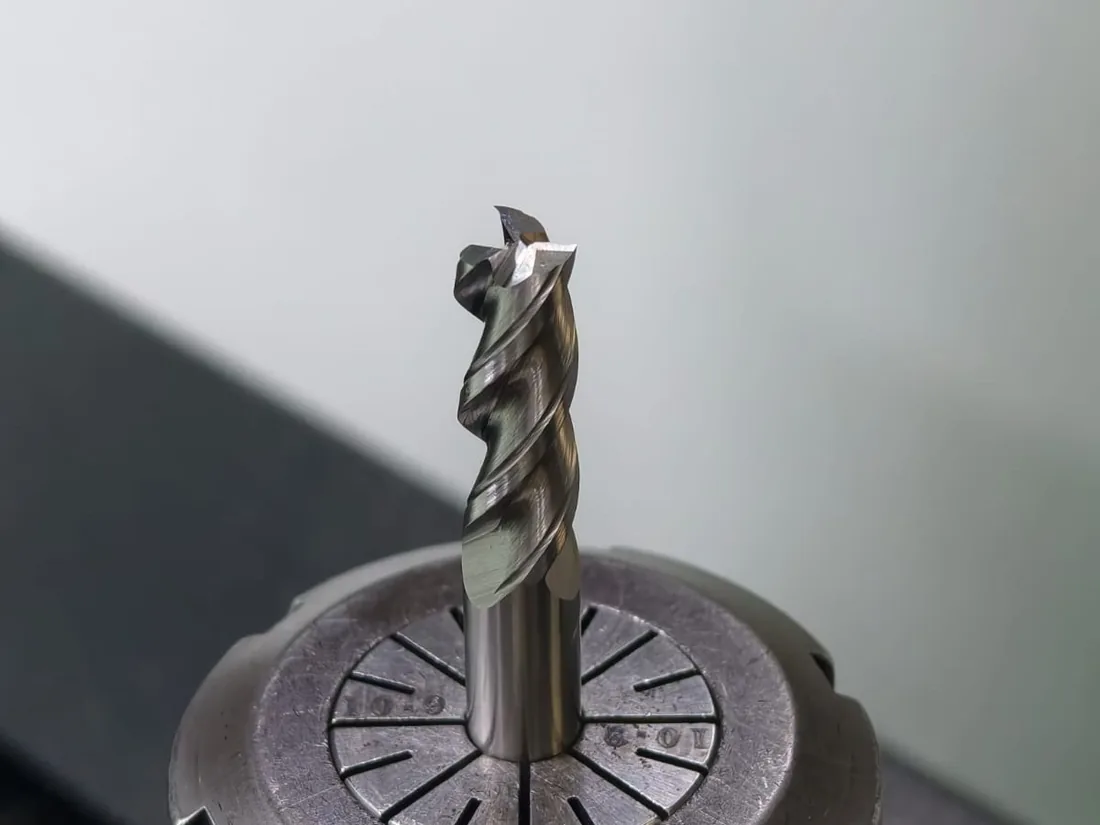 Carbide end mill held in a collet chuck