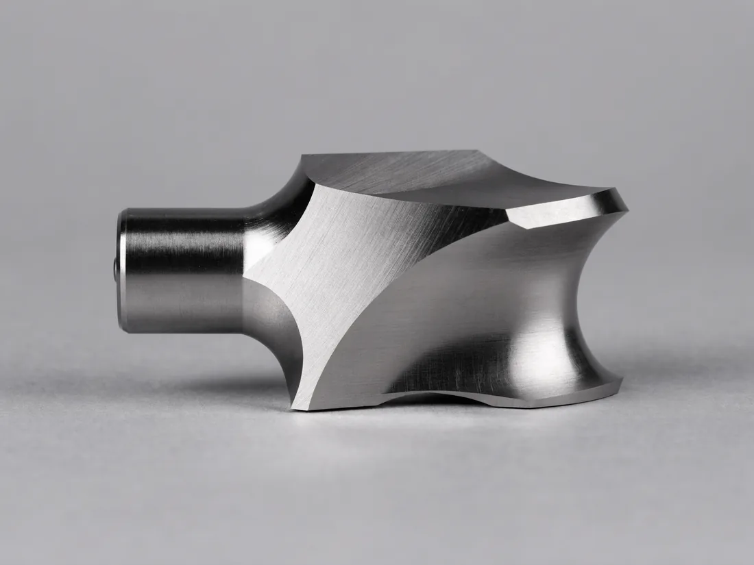 Carbide form cutter with a shaped profile